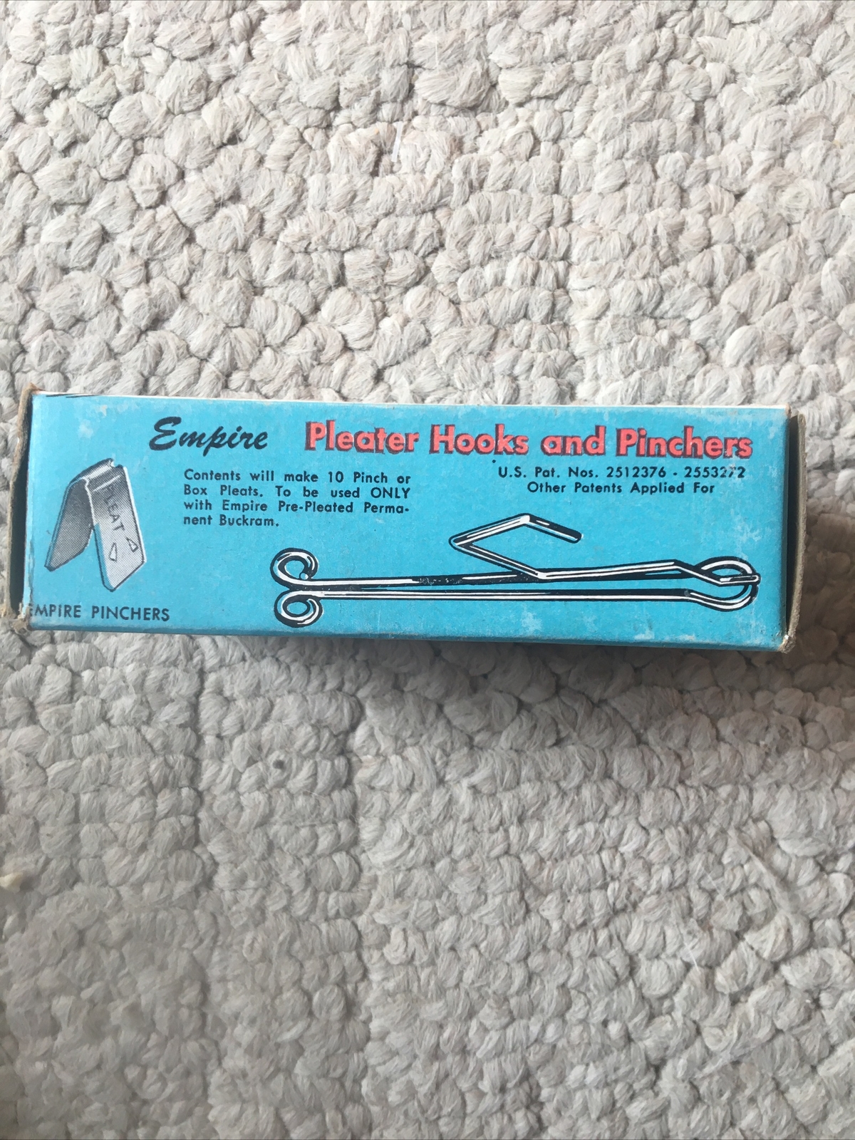 Vintage box of Empire slip-on pleater hooks and pinchers
