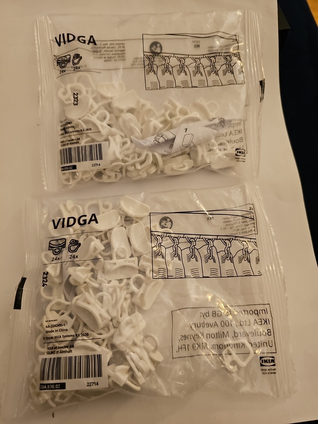 IKEA VIDGA 2 Packs Curtain Gliders and hooks 24 In Each Pack White 204.830.02