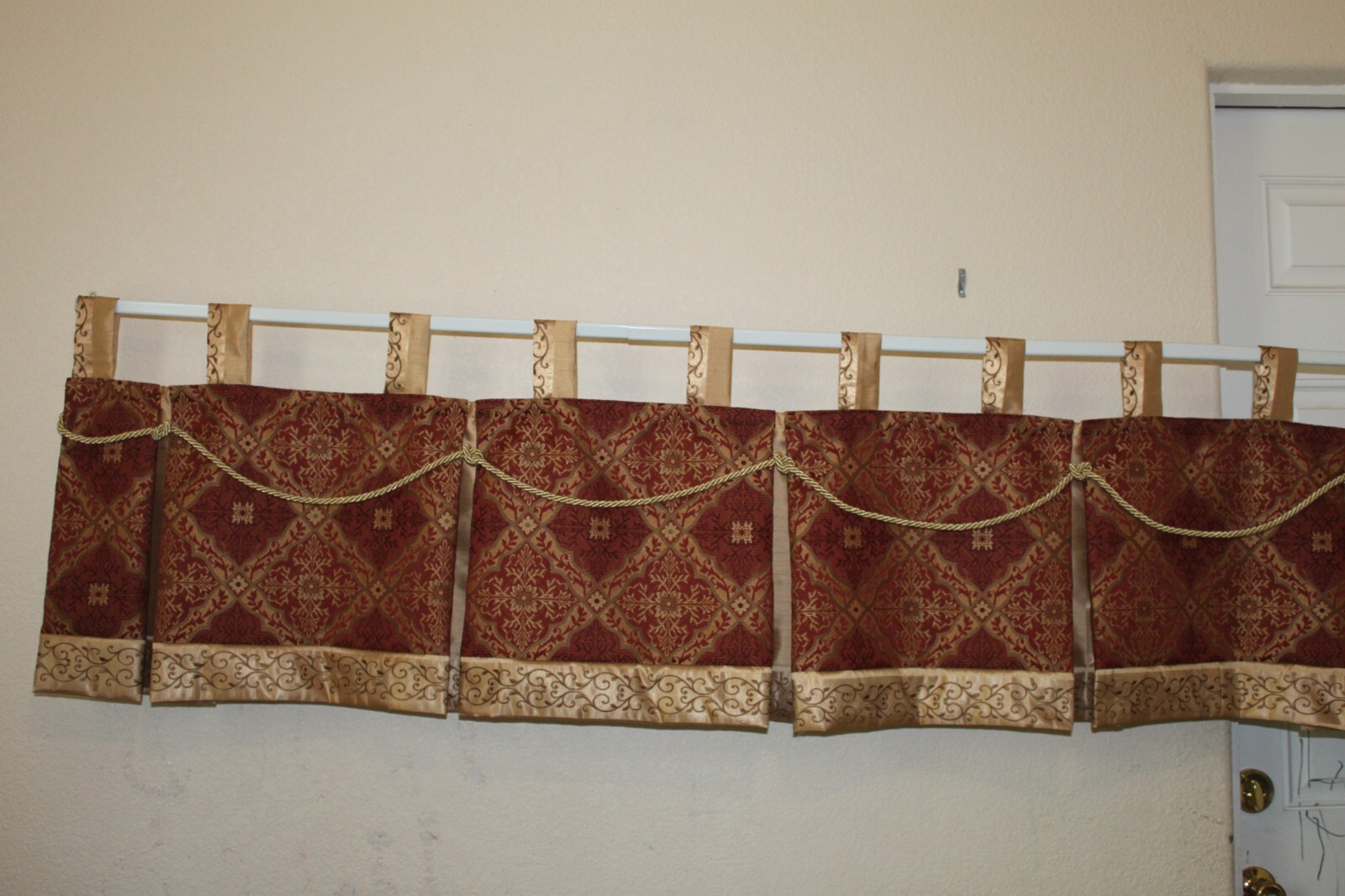Tab top valances burgandy gold pleated.