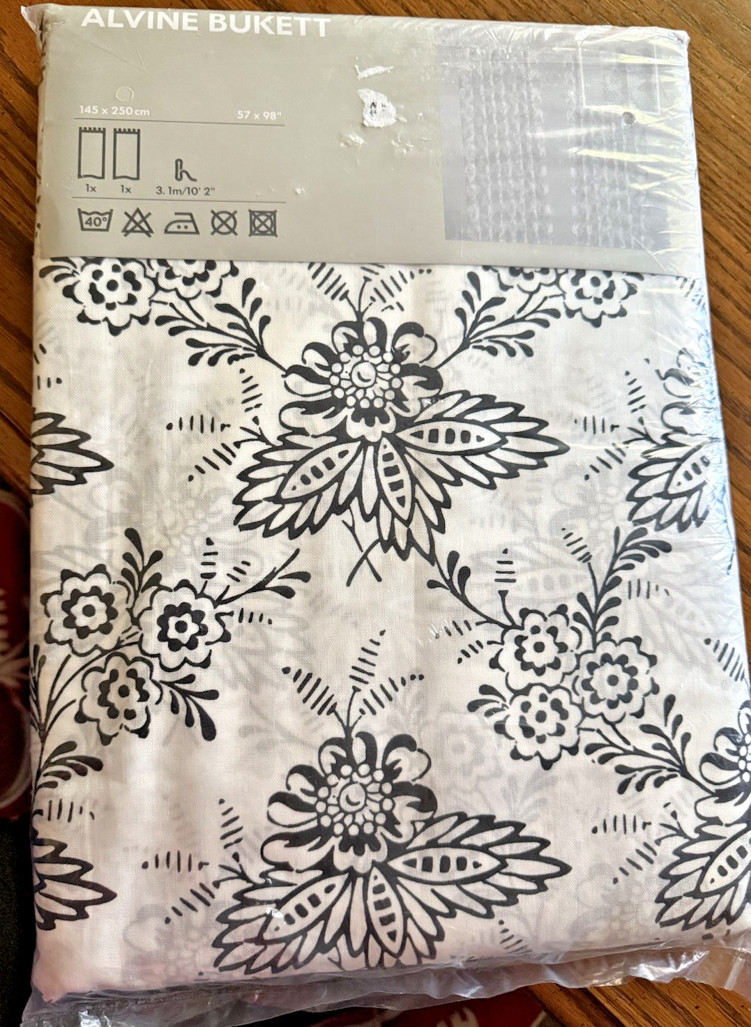 IKEA. Alvine Burkett semi-sheer Floral pair of curtain panels. ” 57 x 98″. NEW.