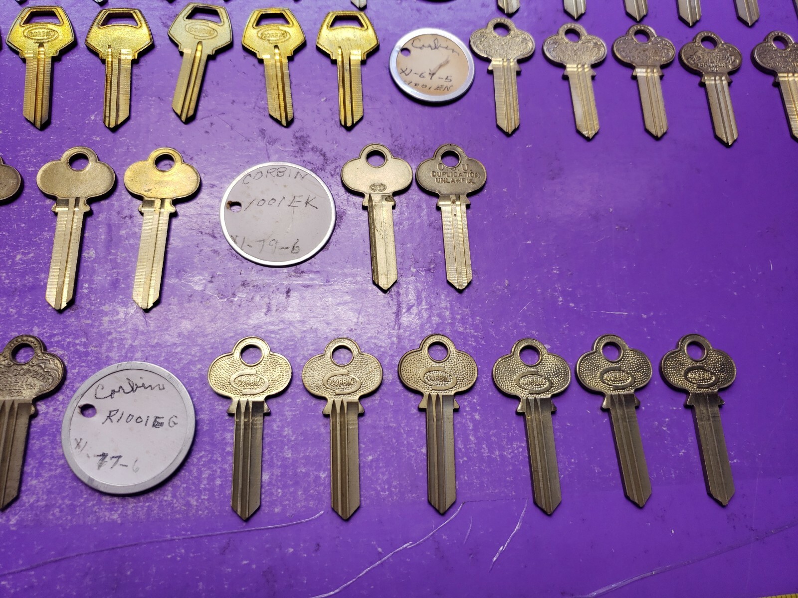 123 ASSORTED LOCKSMITH ORIGINAL CORBIN RUSSWIN KEY BLANKS 1001EB , 1000K SEE PIC
