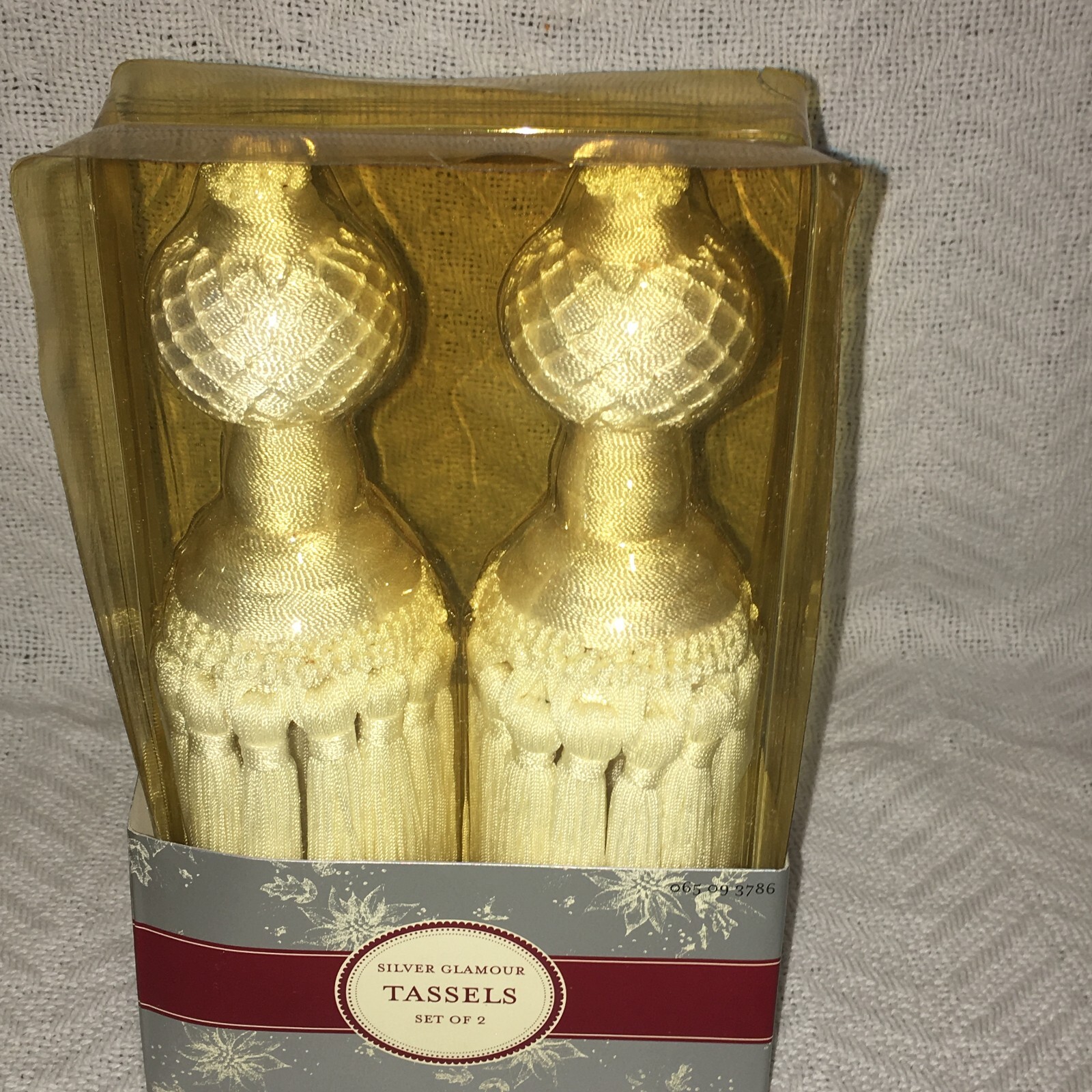 NEW IN BOX IVORY TASSELS BY “SILVER GLAMOUR “ SET OF TWO