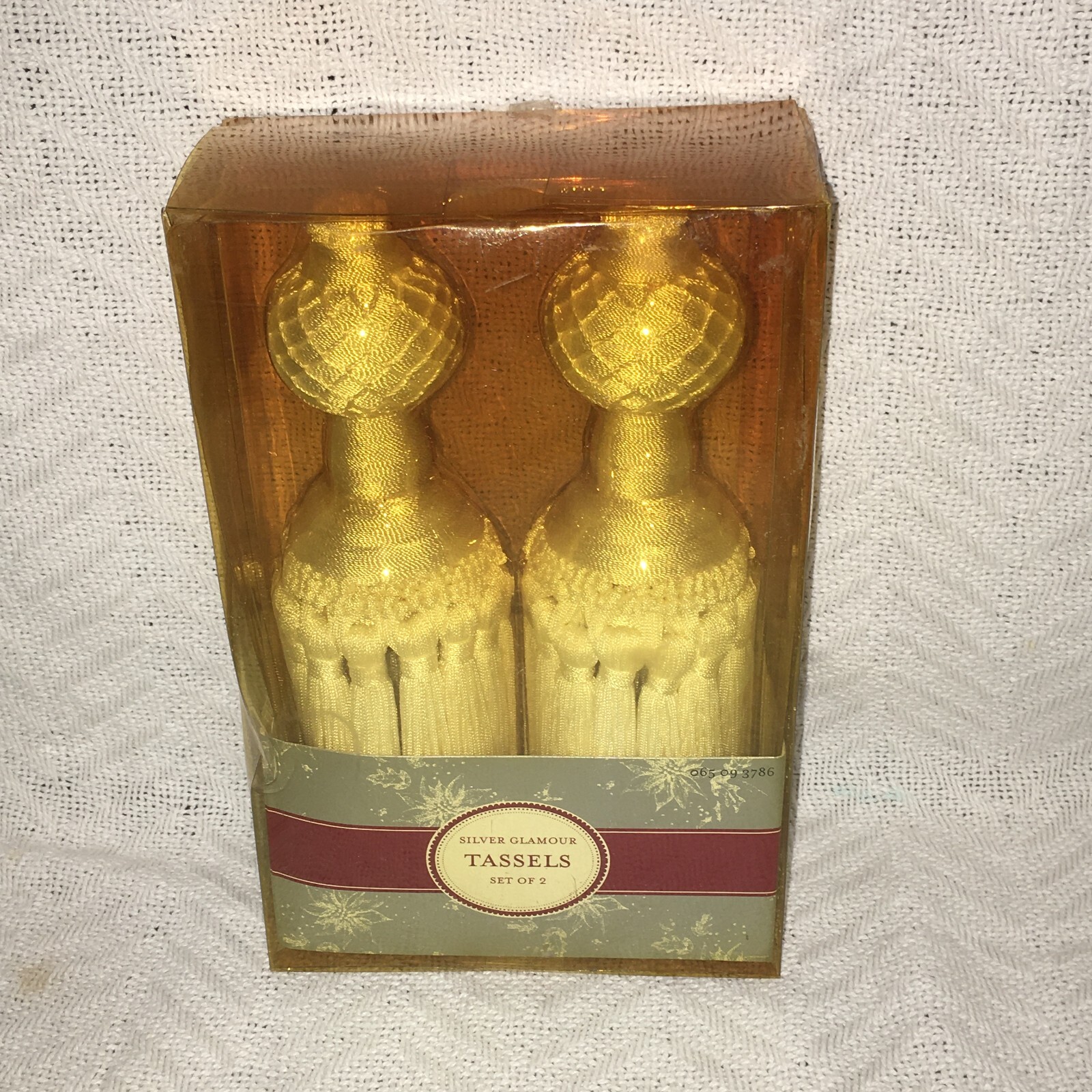 NEW IN BOX IVORY TASSELS BY “SILVER GLAMOUR “ SET OF TWO