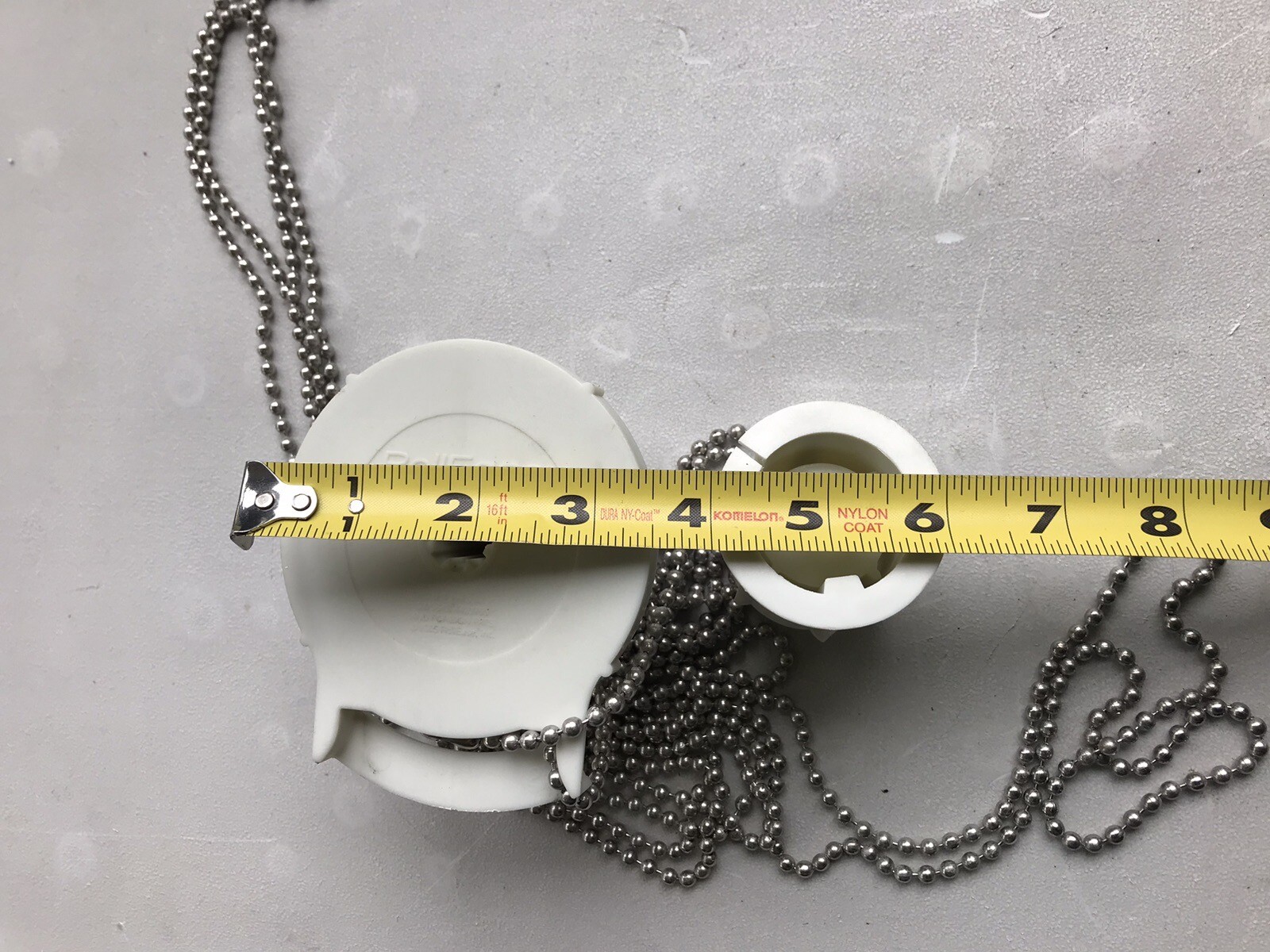 ROLLEASE 3 1/2”. Inside Tube 1 3/8” Clutch W/ Metal Chain and End Plug.