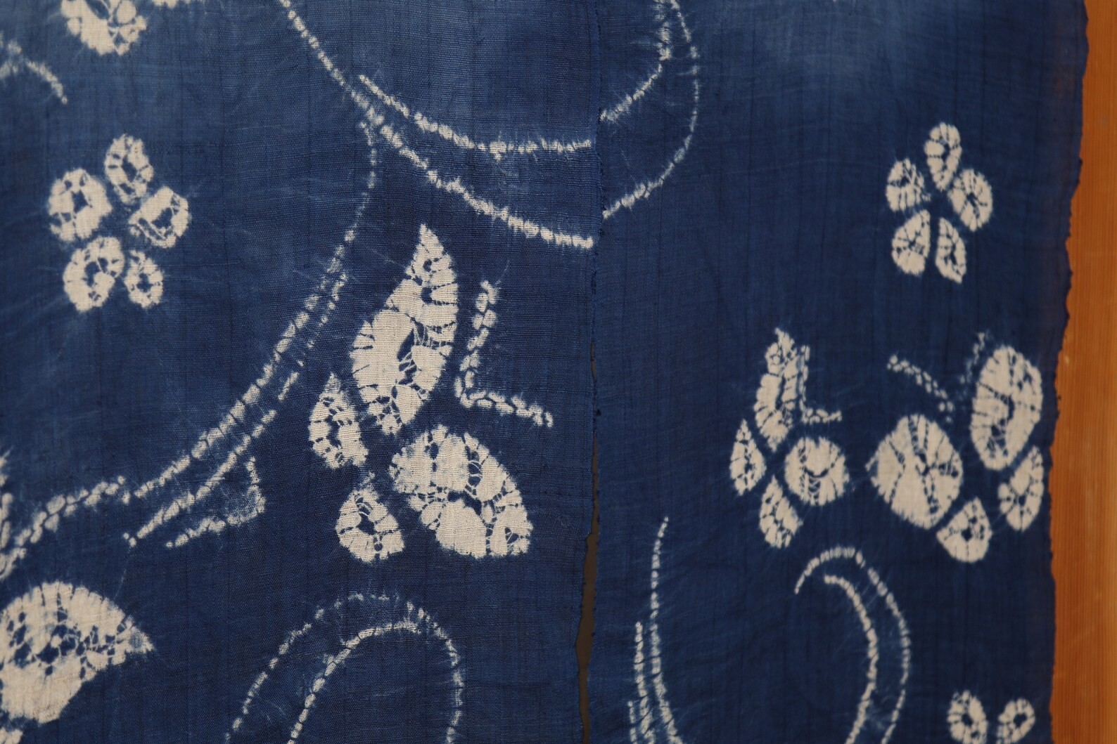 Butterfly and flower on blue