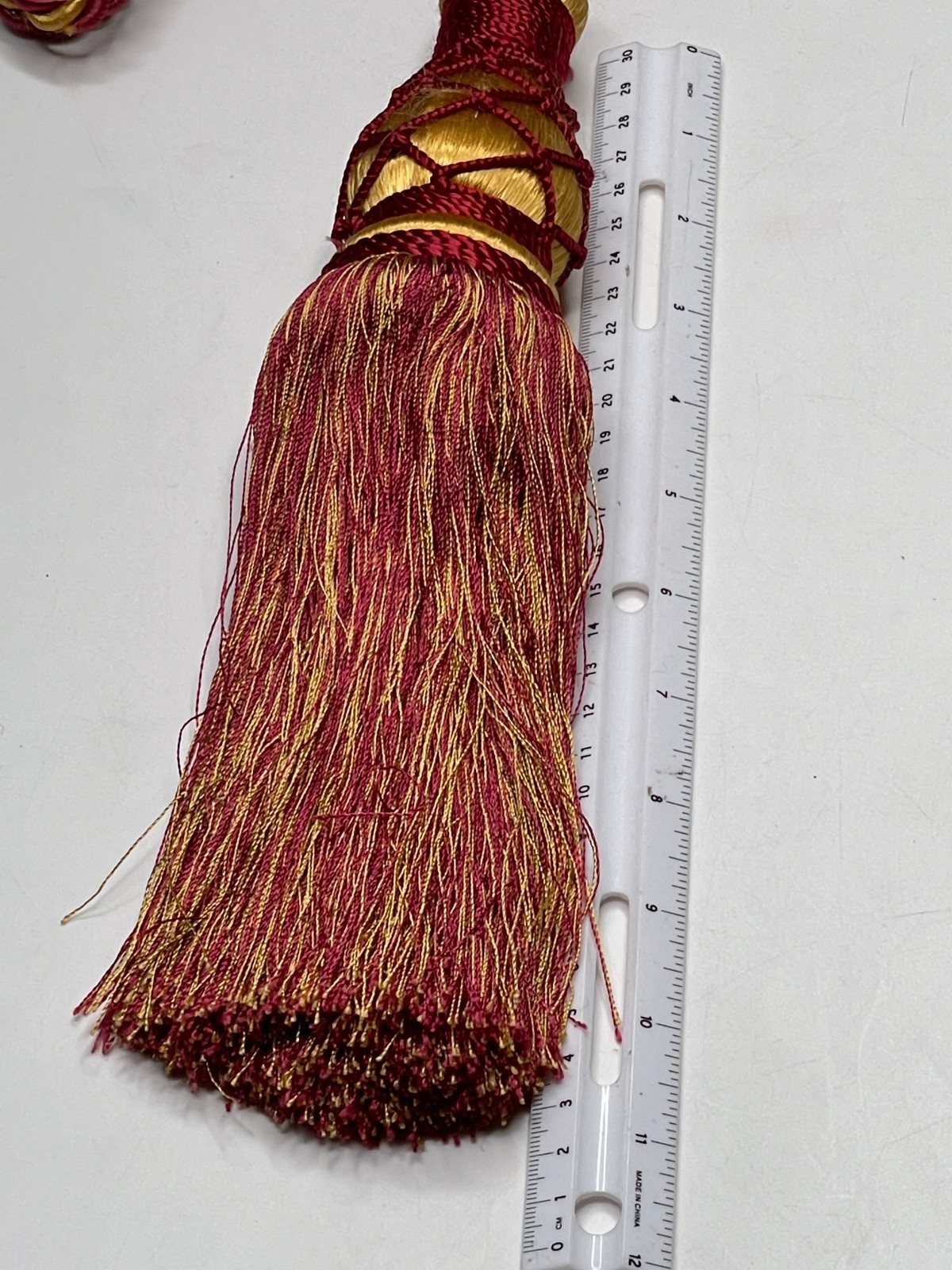 One Deco-Pro Traditional Burgundy and Gold/Beige Curtain Tassel Tieback.