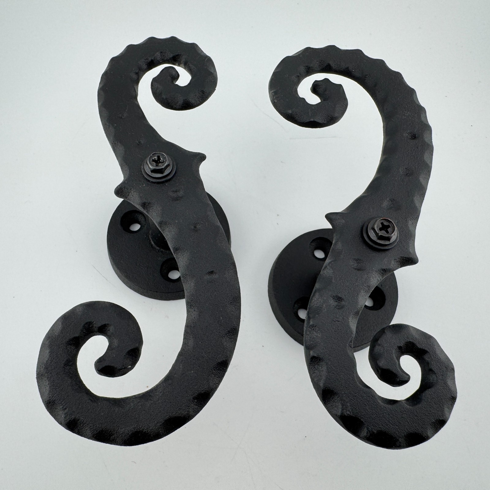 1 Pair – Black Galvanized Iron Scroll Post Mount Shutter Dogs w/ Hammered Edge