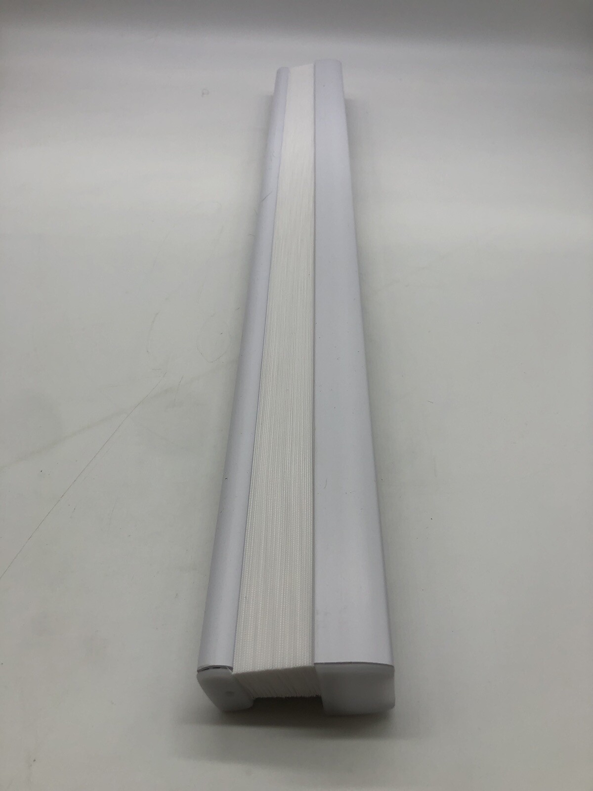 26in X 48in White Light Filtering Cordless Pleated Cellular shade.
