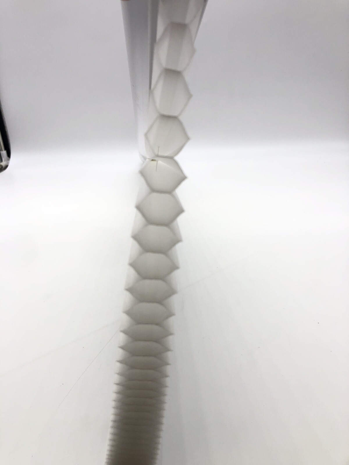 32.5 In x 64 In White Light Filtering Cordless Pleated Cellular shade.