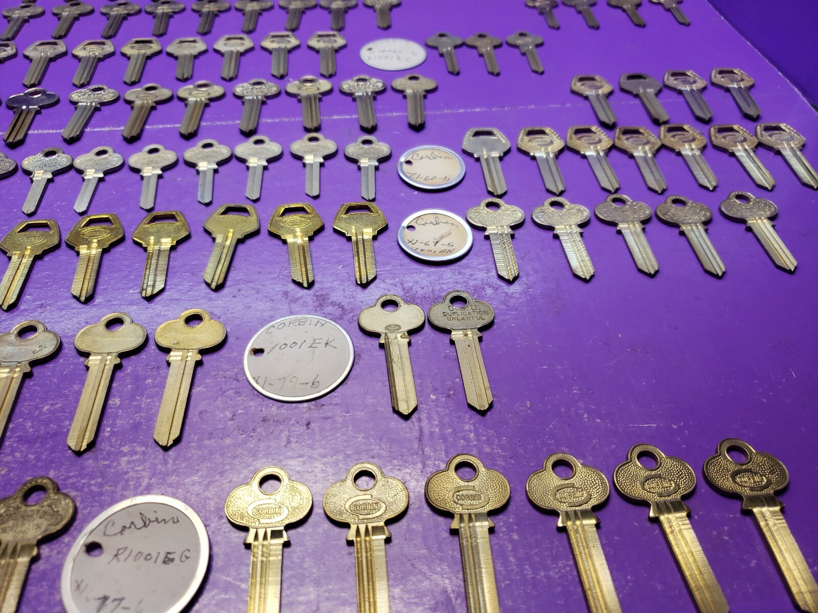 123 ASSORTED LOCKSMITH ORIGINAL CORBIN RUSSWIN KEY BLANKS 1001EB , 1000K SEE PIC